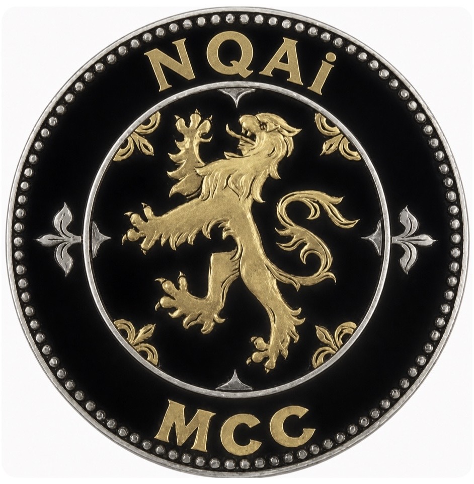 NQAi MCC crest — a golden heraldic lion on a black and silver medallion, NQAi engraved at the top and MCC at the base
